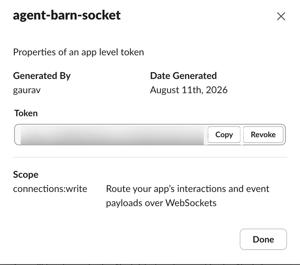 Slack app-level token with the value blurred and Copy button visible